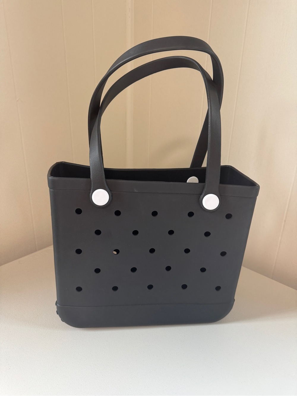 black perforated rubber beach tote bag